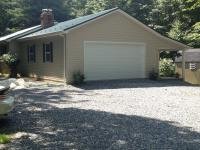 24' x 30' x 9' pole building garage addition to existing house