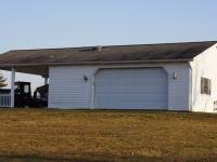 24' x 32' x 9' garage with a 10' porch